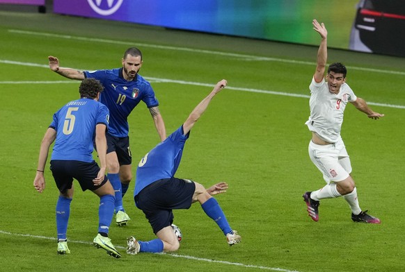 Italy&#039;s Andrea Belotti, right, reacts during the Euro 2020 soccer championship semifinal between Italy and Spain at Wembley stadium in London, Tuesday, July 6, 2021. (AP Photo/Matt Dunham,Pool)