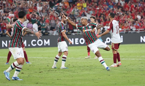 epa11036463 Fluminense's John Kennedy (C) celebrates after scoring the team's second goal during the 2023 FIFA Club World Cup between Fluminense FC and Al Ahly in Jeddah, Saudi Arabia, December 18…