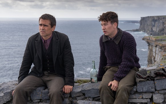 This image released by Searchlight Pictures shows Colin Farrell, left, and Barry Keoghan in &quot;The Banshees of Inisherin.&quot; (Searchlight Pictures via AP)