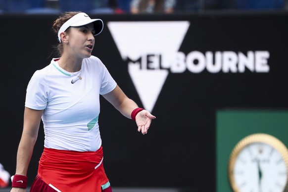 epa09690163 Belinda Bencic of Switzerland reacts against Kristina Mladenovic of France during their first round match at the Australian Open Grand Slam tennis tournament in Melbourne, Australia, 17 Ja ...