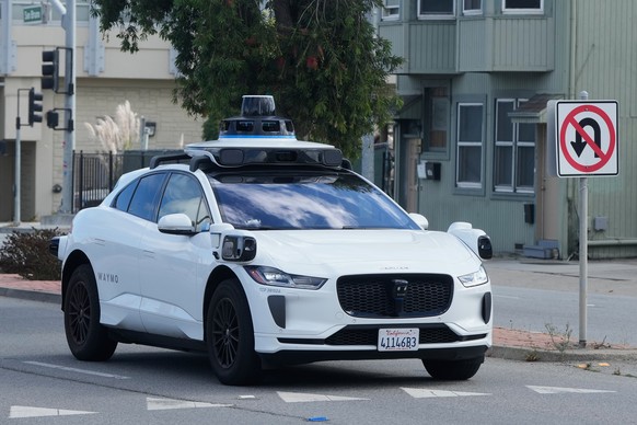 A Waymo vehicle drives past a No U-Turn sign in San Bruno, Calif., Tuesday, Sept. 30, 2025. (AP Photo/Jeff Chiu)
Waymo Traffic Ticket
