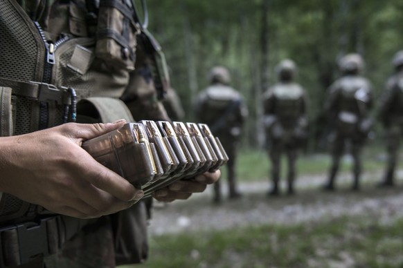 Loaded clips for the assault rifle SG 550, pictured during an urban warfare exercize of the grenadier recruit school of the Swiss Armed Forces in Isone, canton of Ticino, Switzerland, on July 2, 2013. ...