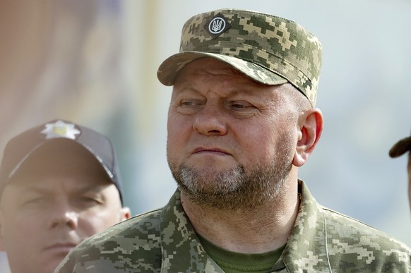 FILE - In this photo provided by the Ukrainian Presidential Press Office, Commander-in-Chief of Ukraine&#039;s Armed Forces Valerii Zaluzhnyi, front, attends an event for marking Statehood Day in Mykh ...