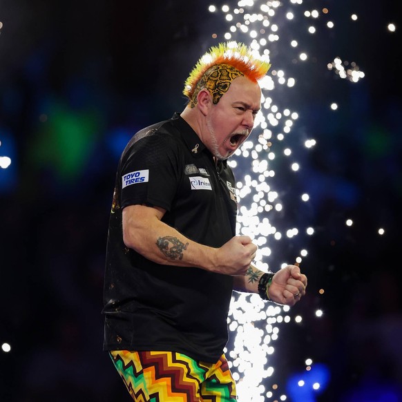 IMAGO / Pro Sports Images

PDC World Darts Championship 2022 Peter Wright celebrates winning the match against Callan Rydz during the PDC World Darts Championship 2022, at Alexandra Palace, London, Un ...