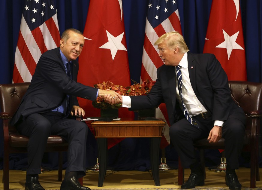 Turkey&#039;s President Recep Tayyip Erdogan, left, and US President Donald Trump shake hands prior to their meeting in New York, Thursday, Sept. 21, 2017. Erdogan is in New York for the United Nation ...