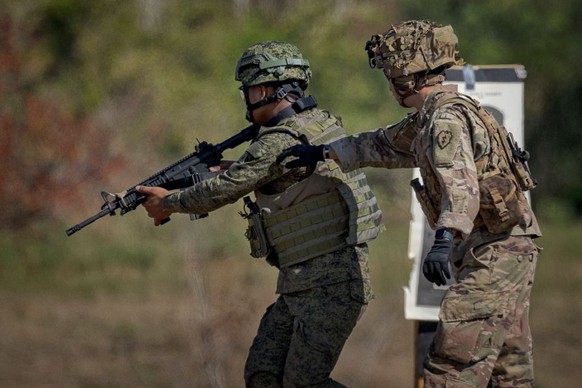 NUEVA ECIJA, PHILIPPINES - MARCH 31: U.S. and Philippine troops participate in a live fire exercise as part of the U.S. and Philippine Army-to-Army joint exercises on March 31, 2023 at Fort Magsaysay, Nueva Ecija, Ph...