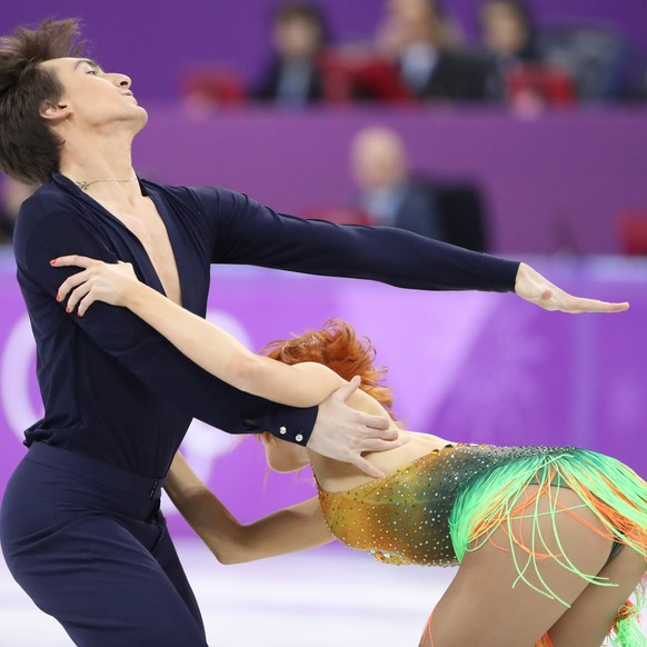 epa06541246 Tiffani Zagorski and Jonathan Guerreiro, Olympic Athletes of Russia (OAR) in action during the Ice Dance Short Dance of the Figure Skating competition at the Gangneung Ice Arena during the ...