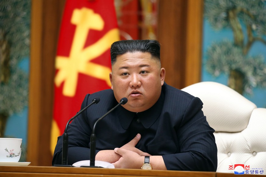 epa08374708 A photo released by the official North Korean Central News Agency (KCNA) shows North Korean leader Kim Jong Un attending a politburo meeting of the ruling Workers' Party of Korea in Pyongy ...