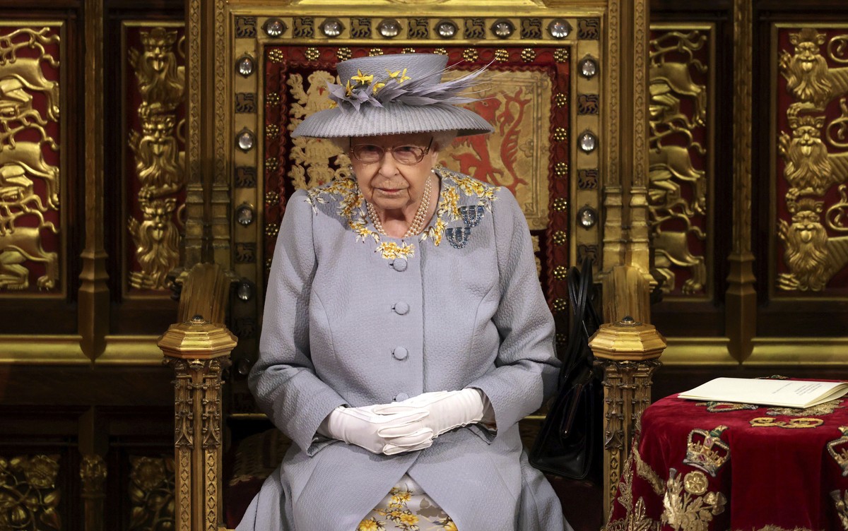 Britain's Queen Elizabeth II delivers a speech in the House of Lords during the State Opening of Parliament at the Palace of Westminster in London, Tuesday May 11, 2021. (Chris Jackson/Pool via A ...