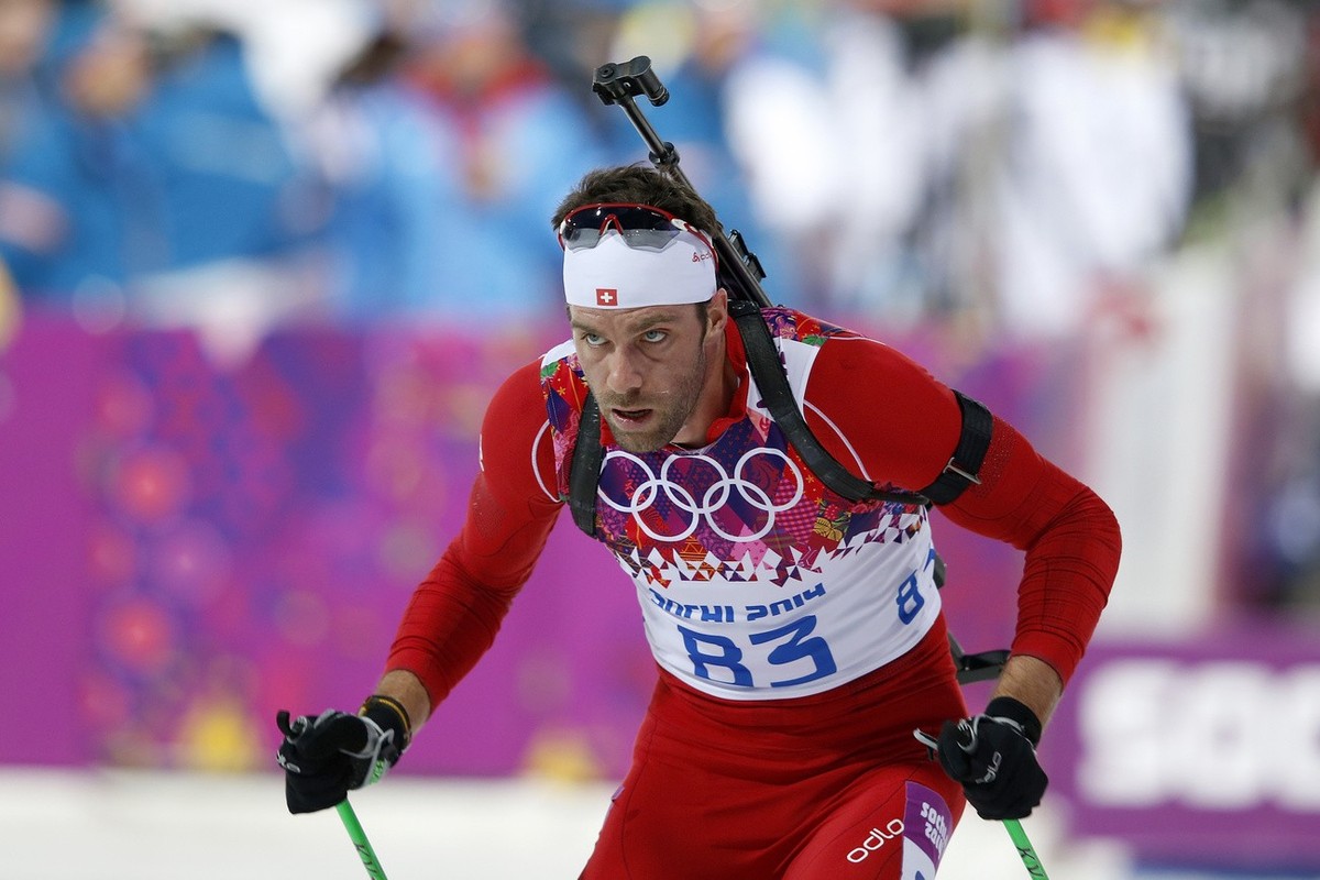 Simon Hallenbarter of Switzerland competes in the men's 20km individual biathlon competition at the XXII Winter Olympics 2014 Sochi in Krasnaya Polyana, Russia, on Thursday, February 13, 2014. (K ...