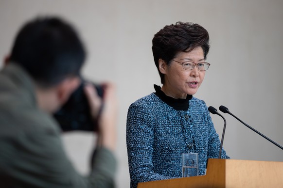 epa07957287 Hong Kong Chief Executive Carrie Lam speaks during a weekly pre-executive council press conference at the Central Government Offices compound in Hong Kong, China, 29 October 2019. EPA/JERO ...