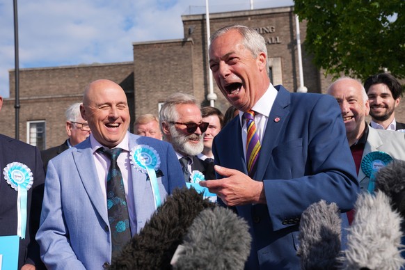 Reform UK leader Nigel Farage speaks to the media, during a visit to Havering Town Hall, in Romford, England, Friday May 8, 2026, a day after the local elections. (Yui Mok/PA via AP)
Britain Elections