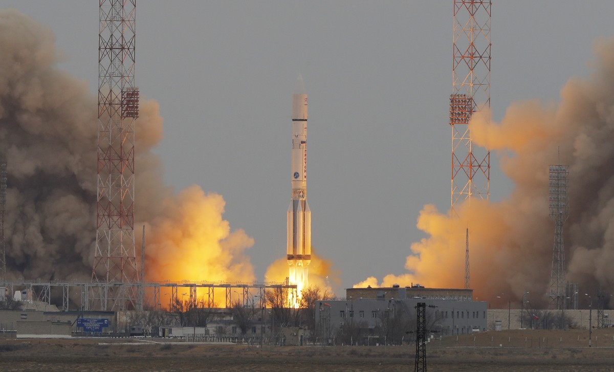 The Proton-M rocket booster blasts off at the Russian leased Baikonur cosmodrome, Kazakhstan, Monday, March 14, 2016. The Russian rocket carries an orbiter for measuring atmospheric gases of Mars and  ...