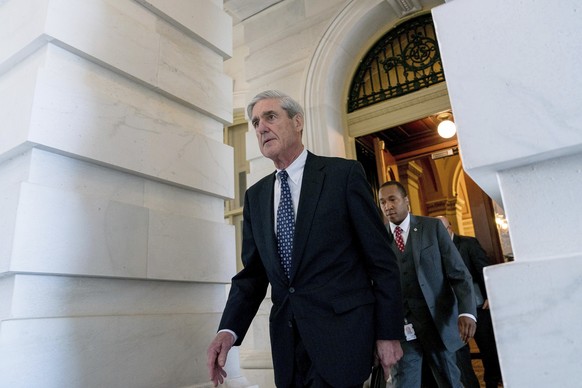 FILE - In this June 21, 2017 file photo, former FBI Director Robert Mueller, the special counsel probing Russian interference in the 2016 election, departs Capitol Hill following a closed door meeting ...