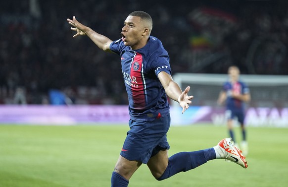 PSG&#039;s Kylian Mbappe celebrates his team&#039;s second side goal during the French League One soccer match between Paris Saint-Germain and Lens at the Parc des Princes stadium in Paris, Saturday,  ...