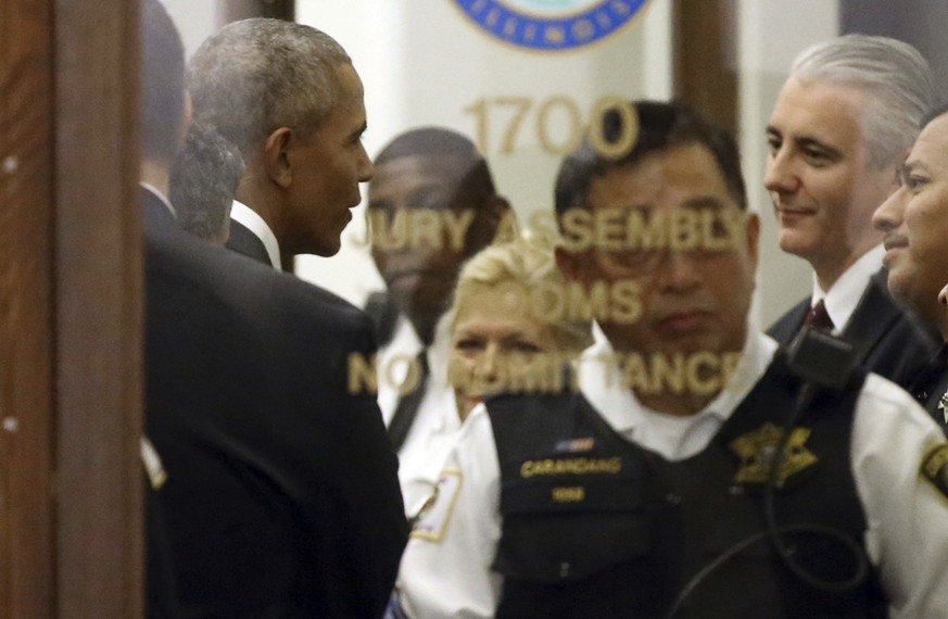 Former President Barack Obama arrives for jury duty in the Daley Center on Wednesday, Nov. 8, 2017, in Chicago. Obama is in line to be paid the same $17.20 a day that others receive for reporting for  ...