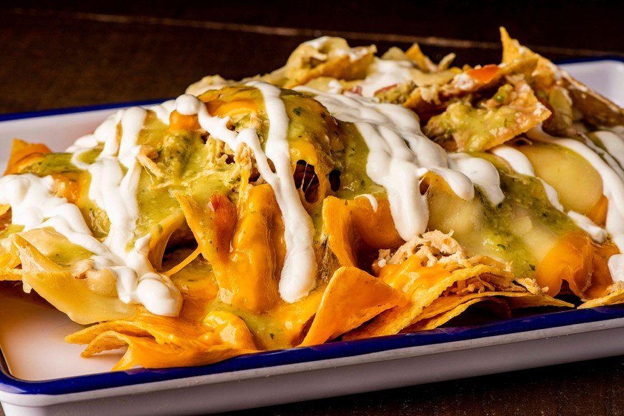 Cheesy Nachos tortilla chips cheese guacamole bar food food food cooking