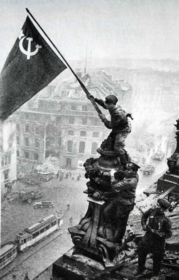 This was the Red Army&#039;s &quot;Iwo Jima&quot; moment: Soviet troops fixing the flag of the Soviet Union atop the Reichstag to conclude the Battle of Berlin.

On May 2, 1945, Soviet photographer Ye ...