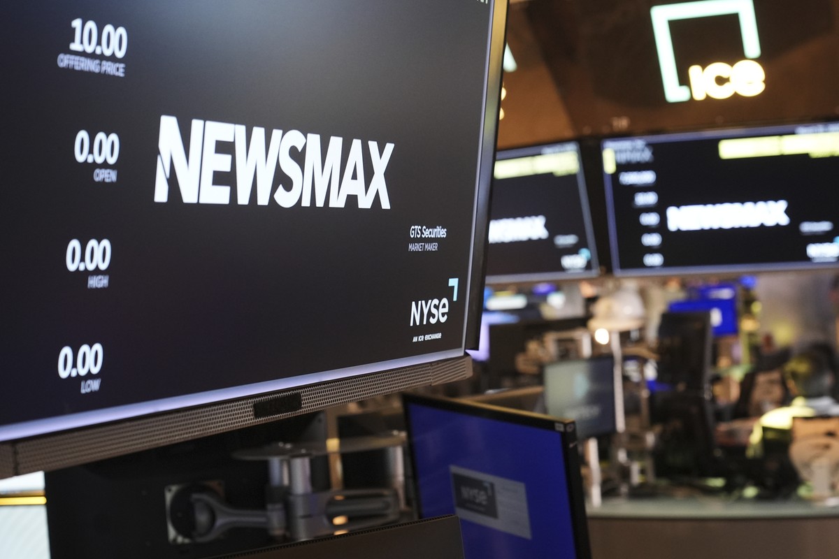 FILE - A display shows a Newsmax logo on the day of their IPO on the floor at the New York Stock Exchange in New York, March 31, 2025. (AP Photo/Seth Wenig, File)
Dominion Newsmax Defamation Case