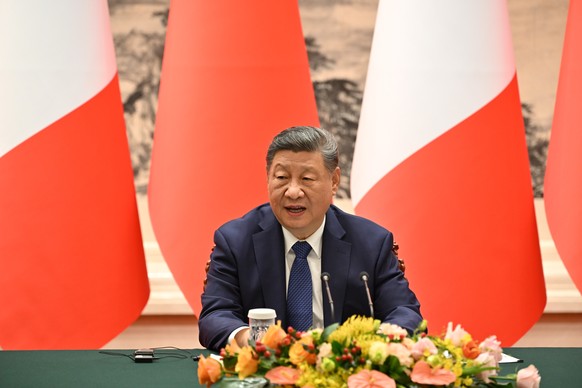 China's President Xi Jinping speaks during a joint press conference with France's President Emmanuel Macron at the Great Hall of the People in Beijing Thursday, Dec. 4, 2025. (Adek Berry/Poo ...