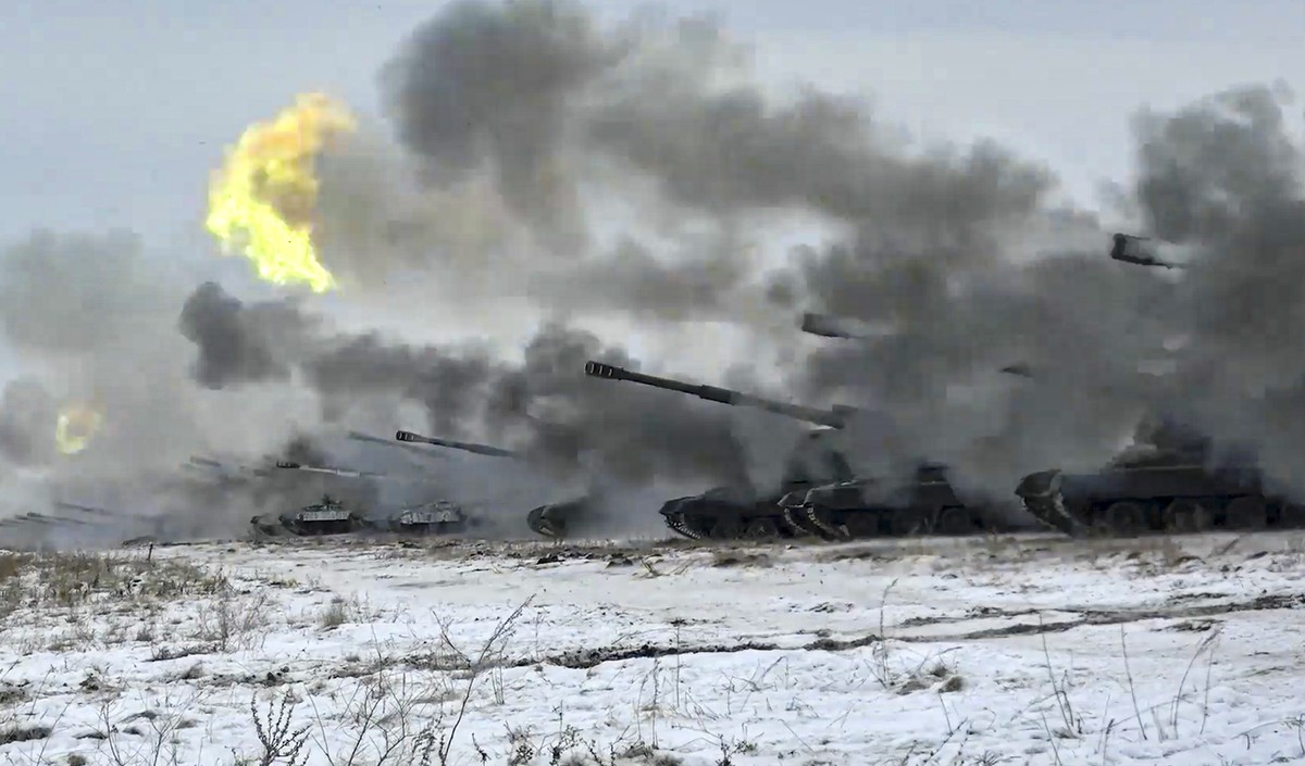 FILE - In this image taken from video and released by Russian Defense Ministry Press Service, Russian army's self-propelled howitzers fire during military drills near Orenburg in the Urals, Russi ...