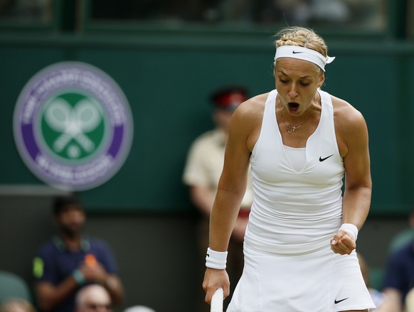 Sabine Lisicki of Germany celebrates after winning the second set of her match against Christina McHale of the U.S.A. at the Wimbledon Tennis Championships in London, July 2, 2015. REUTERS/Stefan Werm ...
