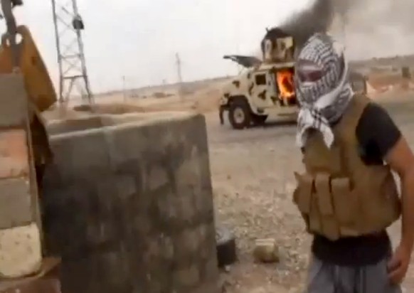 This image made from video posted by Iraqi0Revolution, a group supporting the al-Qaida breakaway Islamic State of Iraq and the Levant (ISIL) on Wednesday, June 11, 2014, which has been verified and is ...