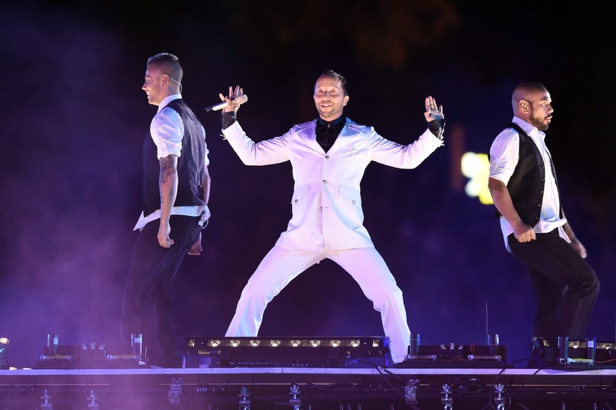 epa04351029 Swiss singer DJ Bobo performs during the opening ceremony at the end of the first day of competition at the European Athletics Championships in the Letzigrund Stadium in Zurich, Switzerlan ...