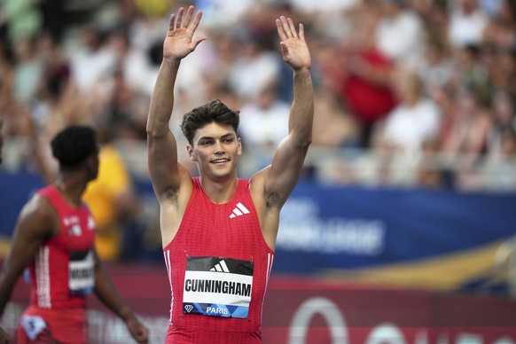 Trey Cunningham, of the United States, reacts after winning the men 110 meters hurdles during the Meeting de Paris Diamond League athletics meet at Stade Charlety in Paris, Friday, June 20, 2025. (AP  ...