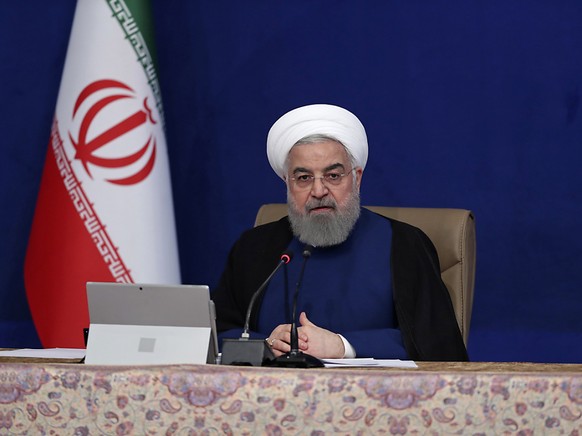 HANDOUT - Das auf der offiziellen Website des Büros der iranischen Präsidentschaft veröffentlichte Foto zeigt Hassan Ruhani, Präsident des Iran, während einer Kabinettssitzung. Foto: Uncredited/Office ...