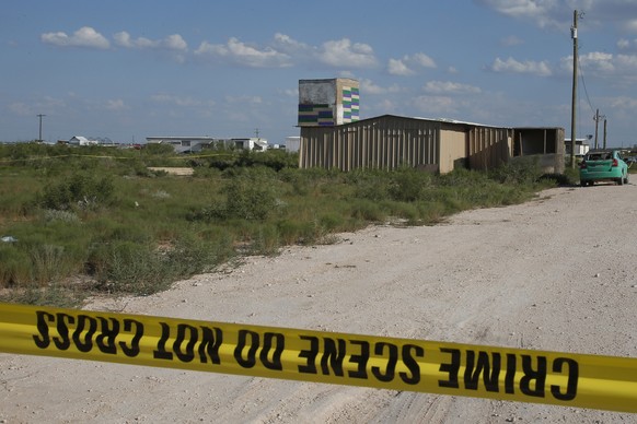 Crime scene tape surrounds the home of Seth Aaron Ator, the alleged gunman in a West Texas rampage Saturday, on Monday, Sept. 2, 2019, near Odessa, Texas. Officers killed 36-year-old Ator on Saturday  ...