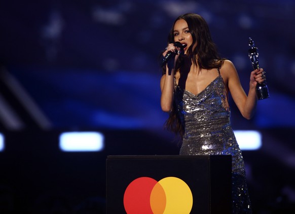 Olivia Rodrigo on stage after winning international song of the year at the Brit Awards 2022 in London Tuesday, Feb. 8, 2022. (Photo by Joel C Ryan/Invision/AP)