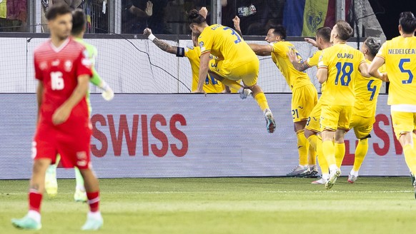 epa10700941 Romania&#039;s players celebrate the 2-2 goal during the UEFA European Qualifiers match between Switzerland and Romania at the Swissporarena stadium in Lucerne, Switzerland, 19 June 2023.  ...