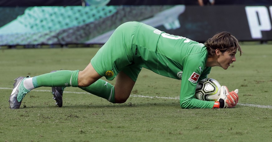 Borussia Dortmund goalkeeper Marwin Hitz stops a shot against Liverpool during the second half of an International Champions Cup tournament soccer match in Charlotte, N.C., Sunday, July 22, 2018. (AP  ...