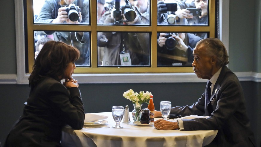 epa07385892 Democratic presidential candidate Sen. Kamala Harris of California (L), meets with civil rights leader Rev. Al Sharpton (R), President of the National Action Network, during lunch at Sylvi ...