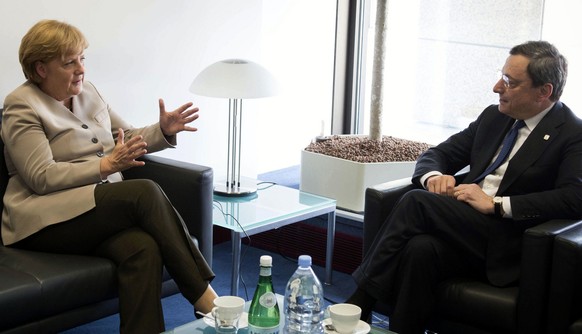 Angela Merkel und Mario Draghi.