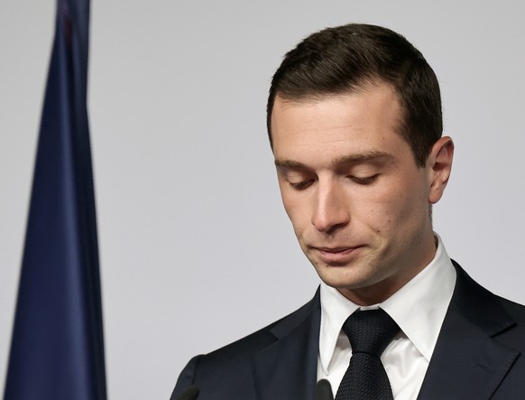 epa11465800 President of the French right-wing party National Rally (Rassemblement National, RN) Jordan Bardella delivers a speech after preliminary results of the second round of the French parliamen ...