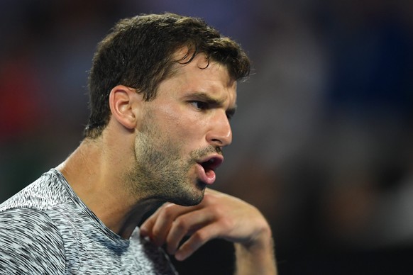 epa05753823 Grigor Dimitrov of Bulgaria reacts during his Men&#039;s Singles semifinal match against Rafael Nadal of Spain at the Australian Open Grand Slam tennis tournament in Melbourne, Australia,  ...