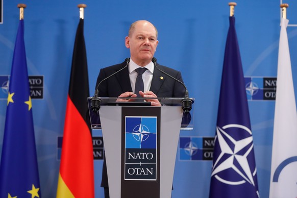 epa09846786 Chancellor of Germany Olaf Scholz gives a press conference at the end of a G7 meeting at the Alliance headquarters in Brussels, Belgium, 24 March 2022. EPA/STEPHANIE LECOCQ