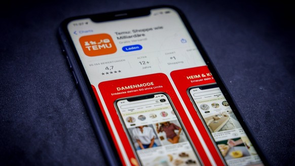 Apple App Store auf einem iPhone. Apps-Charts gratis - Temu: Slogan: Shoppen wie Milliardäre.