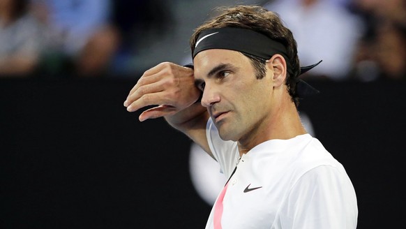 epa06442673 Roger Federer of Switzerland reacts during his first round match against Aljaz Bedene of Slovenia at the Australian Open Grand Slam tennis tournament in Melbourne, Australia, 16 January 20 ...