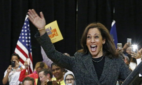 epa08805423 (FILE) - US Senator Kamala Harris waves to the audience during a rally at Texas Southern University Recreational Center in Houston, Texas, USA, 23 March 2019 (reissued 07 November 2020). K ...