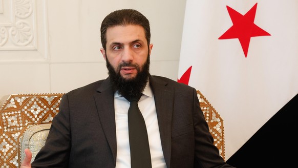 epa11816365 Syria&#039;s leader Ahmed al-Sharaa, also known as Abu Mohammed al-Jolani, during his meeting with Italy&#039;s foreign affairs minister in Damascus, Syria, 10 January 2025. Tajani is in S ...
