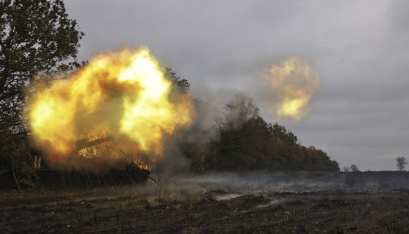 epa10264069 Ukrainian self-propelled artillery firing from a position on a frontline near the city of Bakhmut, Donetsk region, eastern Ukraine, 24 October 2022 (issued 25 October 2022). The Ukrainian  ...