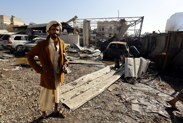 epa07496923 A Yemeni inspects the site of a Saudi-led airstrike hit a workshop at a neighborhood in Sana’a, Yemen, 10 April 2019. According to reports, the Saudi-led military coalition has intensified ...