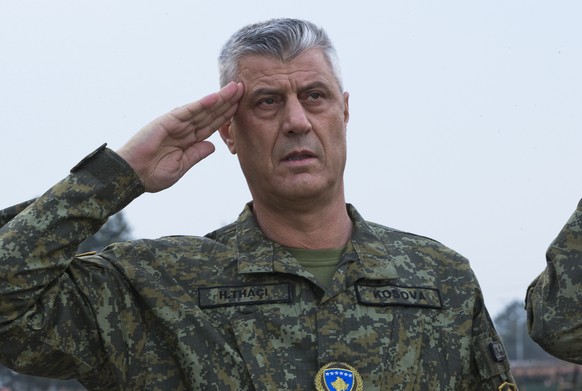 Kosovo president Hashim Thaci salutes as he inspects members of Kosovo Security Force in capital Pristina, Kosovo, on Thursday, Dec. 13, 2018. Kosovo lawmakers are set to transform the Kosovo Security ...