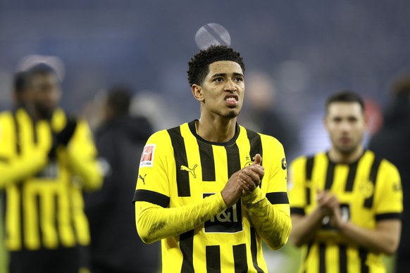 epa10515783 Dortmund&#039;s Jude Bellingham (C) and teammates react after the German Bundesliga soccer match between FC Schalke 04 and Borussia Dortmund in Gelsenkirchen, Germany, 11 March 2023. EPA/R ...