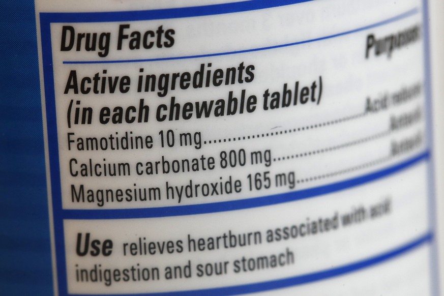 This June 15, 2020 photo shows a Pepcid antacid label listing the active ingredient famotidine in Washington. The U.S. government&#039;s Pepcid project has revealed what critics describe as the Trump  ...