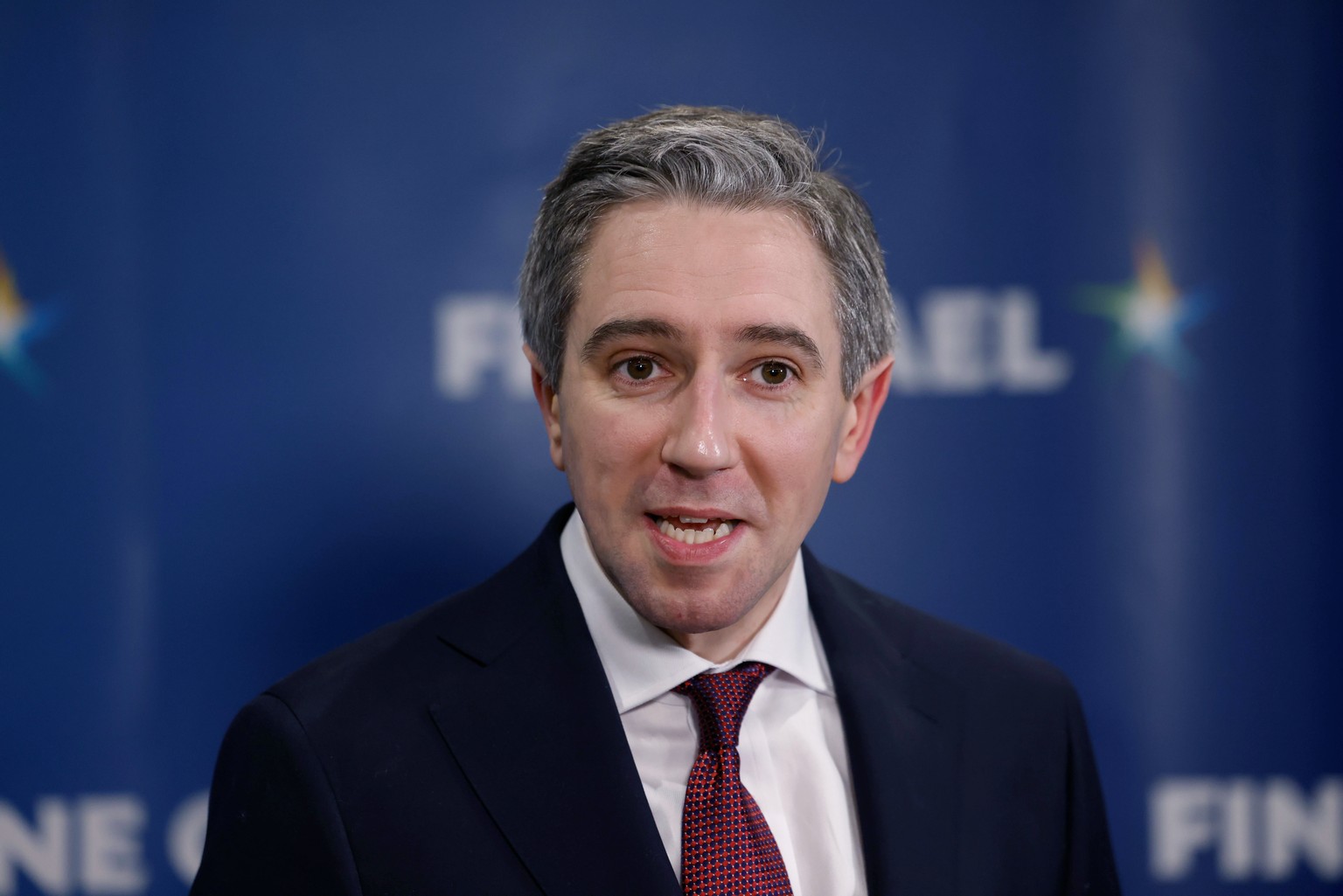 epa11241574 New leader of Fine Gael, Simon Harris speaks to the media at the Sheraton Hotel in Athlone, Ireland, 24 March 2024. Following a shortened leadership contest, Simon Harris became the new de ...