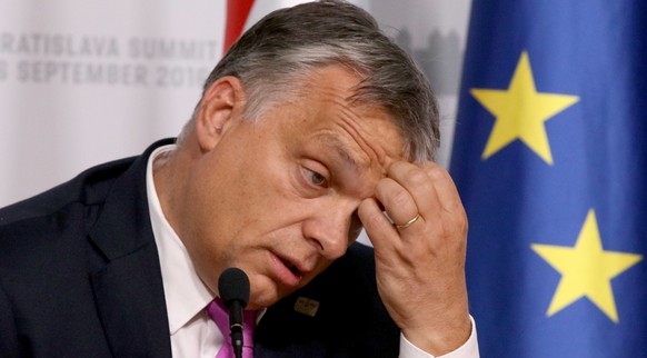 Hungarian Prime Minister Viktor Orban attends a press conference after the EU summit in Bratislava Friday, Sept. 16, 2016. The EU summit, without the participation of the United Kingdom, kicked off th ...